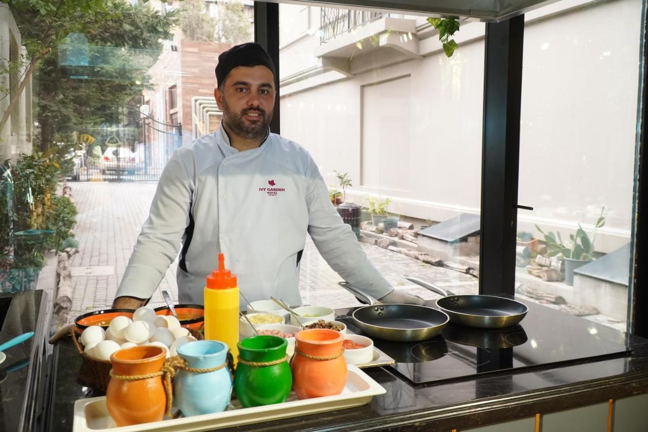 Ivy Garden Hotel Baku Exteriör bild A street vendor in Athens, Greece